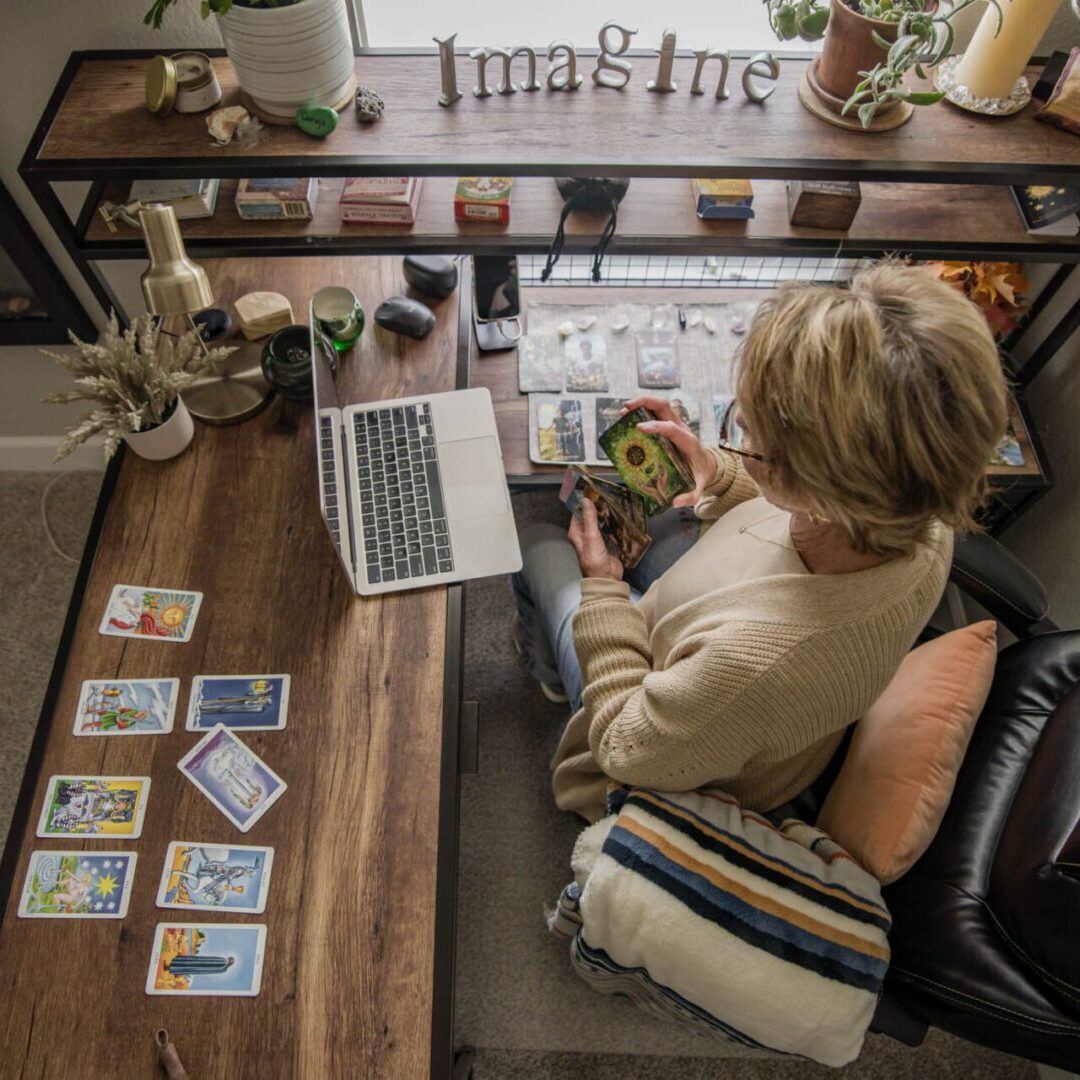Tarot reading setup with laptop